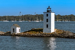 Dutch Island Lighthouse Tower with Bridge in Background